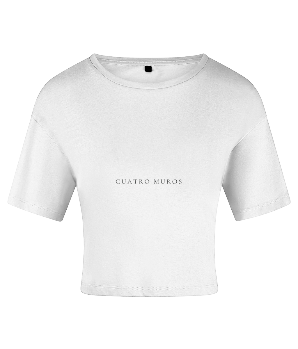 The Cristal Crop in White, cropped cotton t-shirt with the Cuatro Muros wordmark across the front