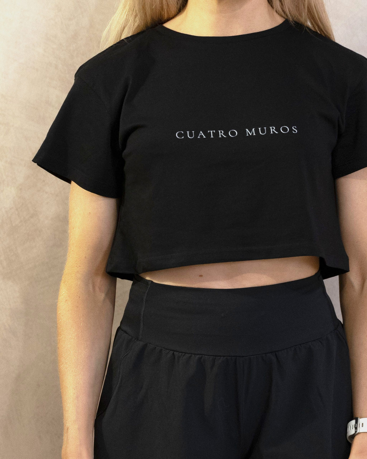 The Cristal Crop in Black, front, worn by a 5ft 6 model in size XS