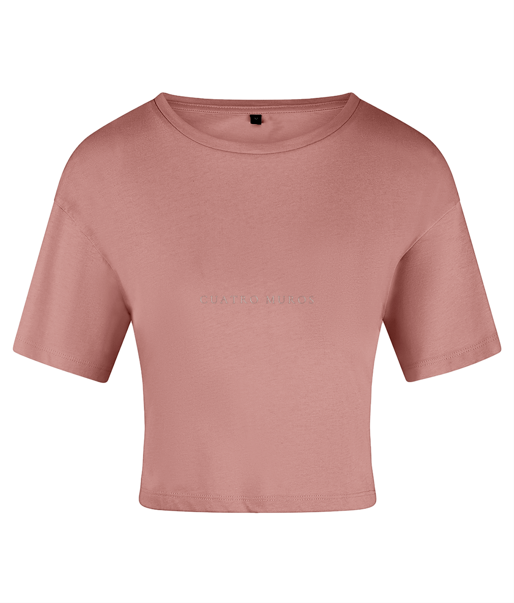 The Cristal Crop in Dusky Pink, cropped cotton t-shirt with the Cuatro Muros wordmark across the front