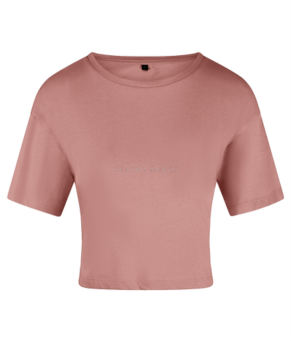 The Cristal Crop in Dusky Pink, cropped cotton t-shirt with the Cuatro Muros wordmark across the front