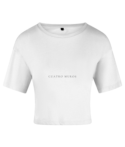The Cristal Crop in White, cropped cotton t-shirt with the Cuatro Muros wordmark across the front