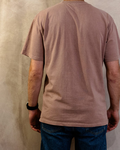 The Muro Tee in Faded Pink, back, worn by a 6ft model in size Large